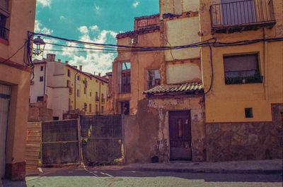 Buildings in city against sky