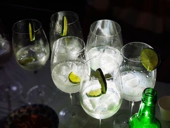 Close-up of wine glasses on table