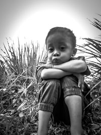 Cute baby girl on field