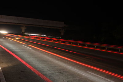 Light trails on road at night