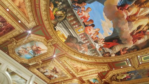 Low angle view of ornate ceiling