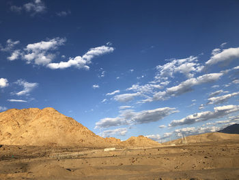 Scenic view of desert against sky