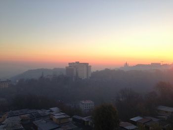 High angle view of cityscape against sky during sunset