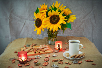 Sunflowers in vase on table