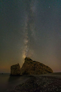 Scenic view of sea against sky at night