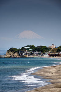 Scenic view of sea against blue sky