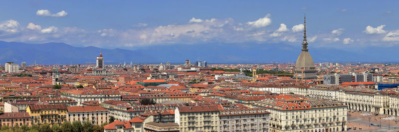 Panoramic view of cityscape against sky