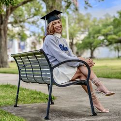 Portrait of woman sitting on chair