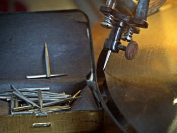 High angle view of machine part on table