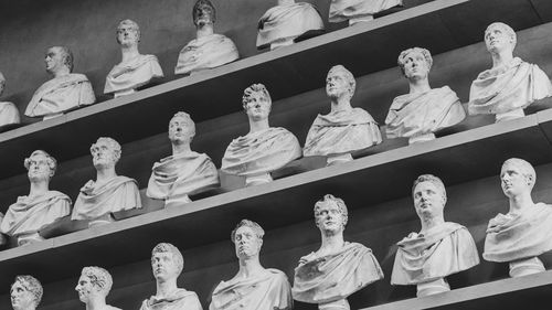 Low angle view of statues in shelves