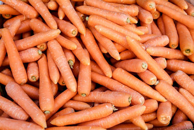 Full frame shot of carrots for sale at market