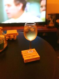 Close-up of wineglass on table