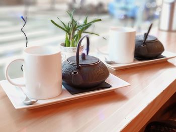 Close-up of coffee served on table