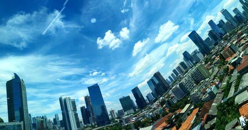 Panoramic view of modern buildings against sky