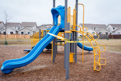 Playground against blue sky in park