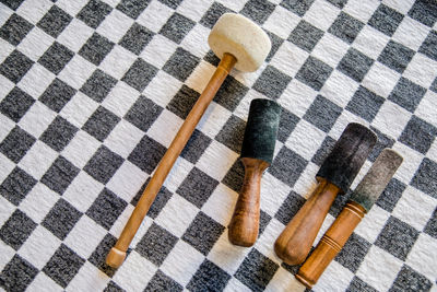 High angle view of paintbrushes on floor