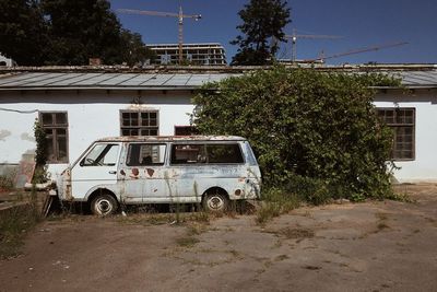 Car on street by building