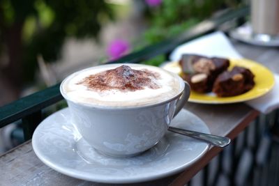 Close-up of coffee served on table