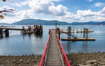 Pier on sea against sky