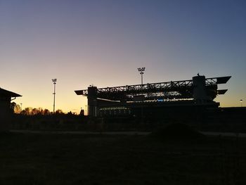 Silhouette of building at sunset