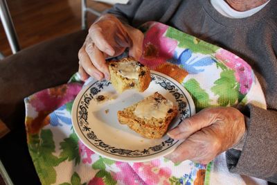 High angle view of woman holding food