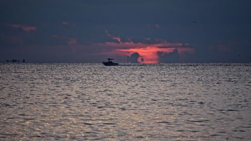 Scenic view of sea at sunset