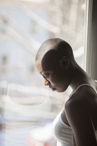 Close-up portrait of shirtless man