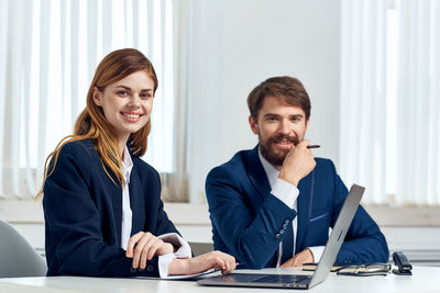 Portrait of smiling young couple