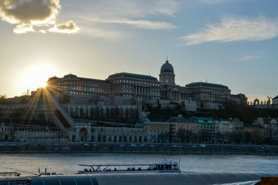 View of cityscape against sky during sunset