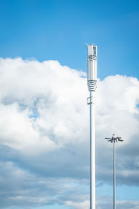 Low angle view of 5g tower against sky