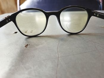 Close-up of sunglasses on table