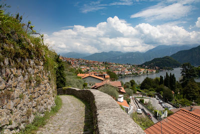 Panoramic view of buildings and mountains against sky