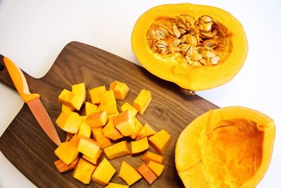 High angle view of yellow pumpkin on table