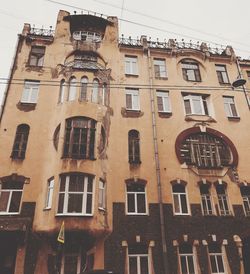 Low angle view of residential building against sky