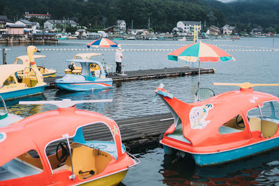 View of boats moored in lake