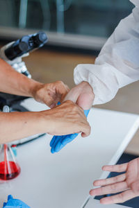 High angle view of people working on table