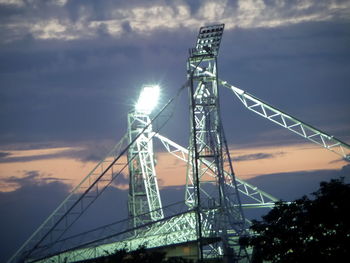 Low angle view of tower at sunset