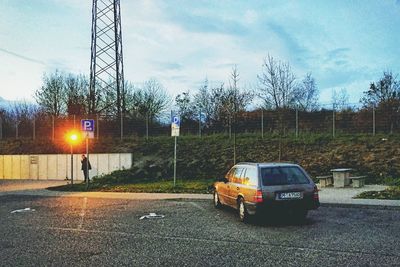 Cars on road against sky