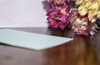 Close-up of purple flowers on table