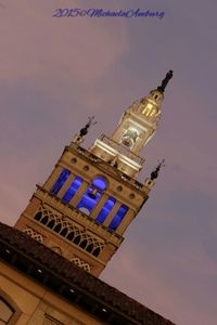 Low angle view of clock tower against clear sky