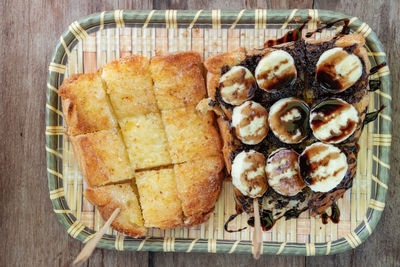 High angle view of bread in basket on table