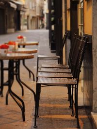 Chairs and table at sidewalk cafe