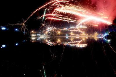 Firework display at night