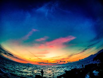 Scenic view of sea against sky during sunset