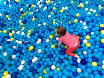 High angle view of boy playing in swimming pool