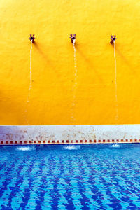 Close-up of yellow swimming pool