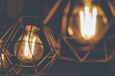 Close-up of illuminated light bulb