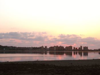 Scenic view of lake against sky during sunset