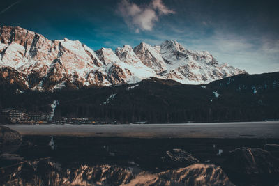 Scenic view of snowcapped mountains against sky