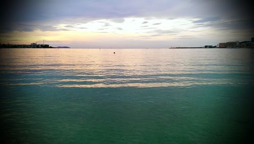 Scenic view of sea at sunset